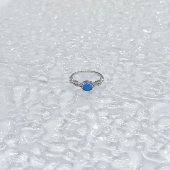 Silver ring with opal and cubic zirconia