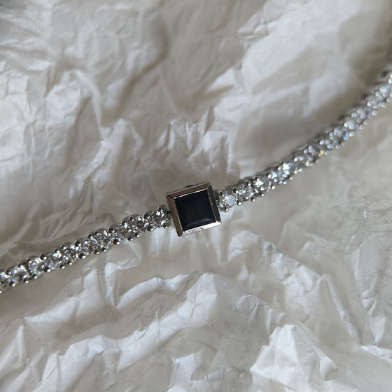 Silver bracelet with a sapphire