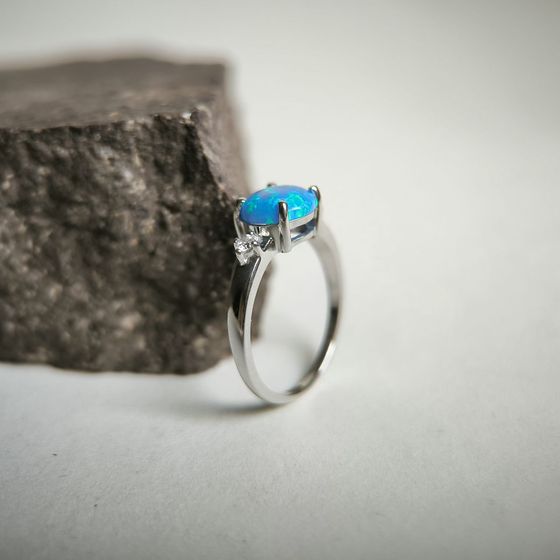 Silver ring with a 1.067-carat opal and cubic zirconia