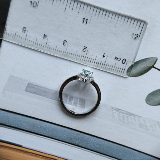 Silver ring with a 0.893-carat topaz and cubic zirconia