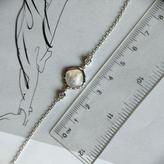 Silver bracelet with mother-of-pearl, phyanites