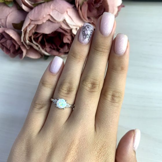 Silver ring with a 0.669-carat opal