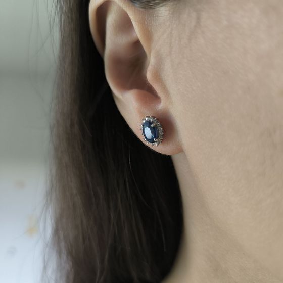 Silver earrings with a 2.237-carat sapphire and cubic zirconia