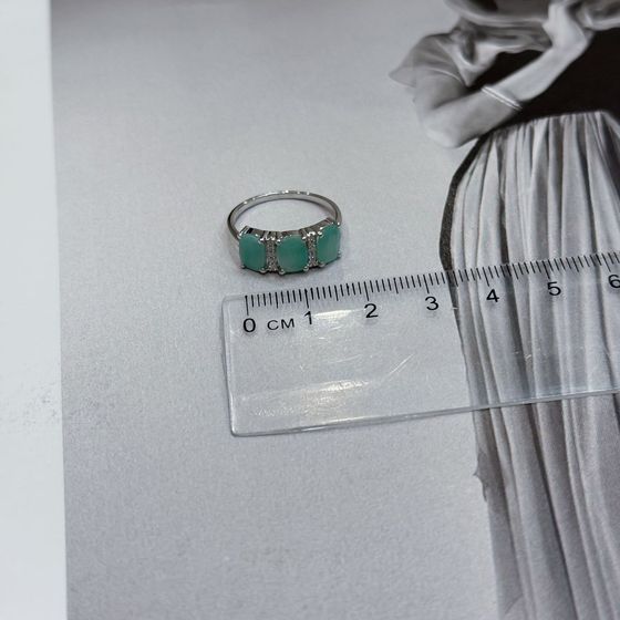 Silver ring with emerald, fianites