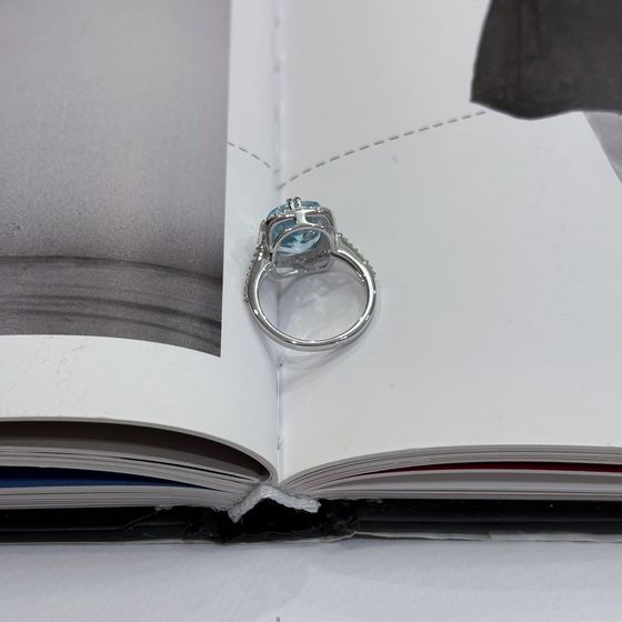 Silver ring with a 6.507-carat topaz and cubic zirconia