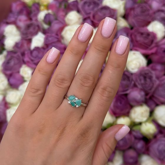 Silver ring with emerald, fianites