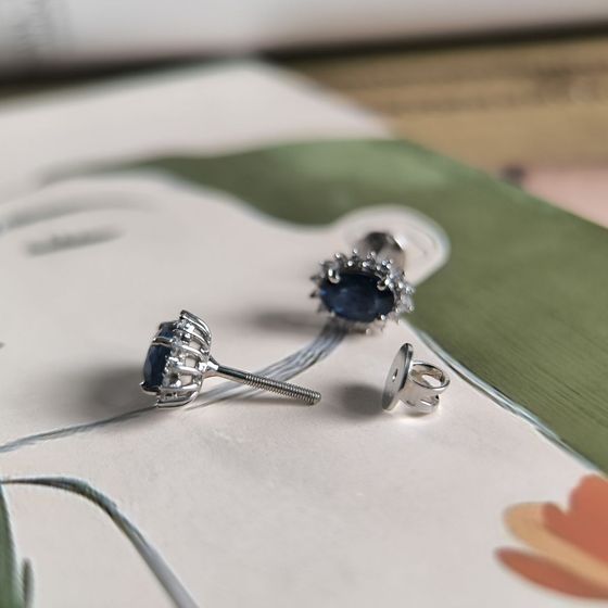 Silver earrings with a 2.237-carat sapphire and cubic zirconia