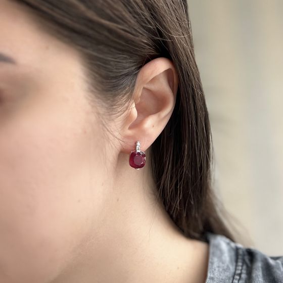 Silver earrings with a ruby