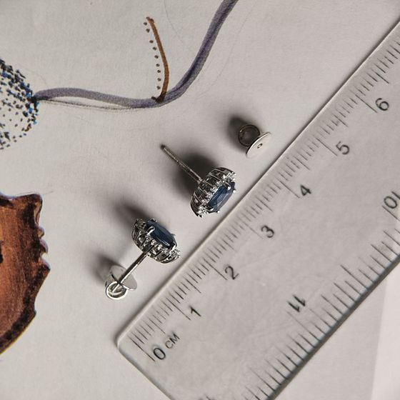 Silver earrings with a 2.237-carat sapphire and cubic zirconia