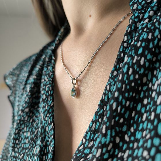 Silver pendant with a 0.555-carat mystic topaz