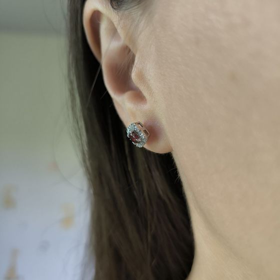 Silver earrings with a 0.949-carat garnet and cubic zirconia