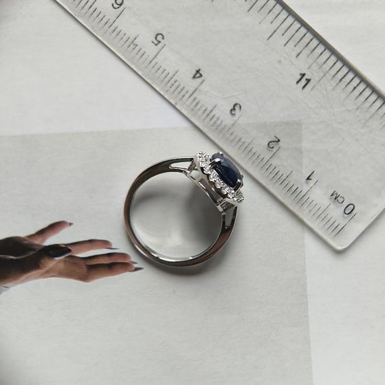 Sterling silver ring with 2.895ct sapphire, pave diamonds