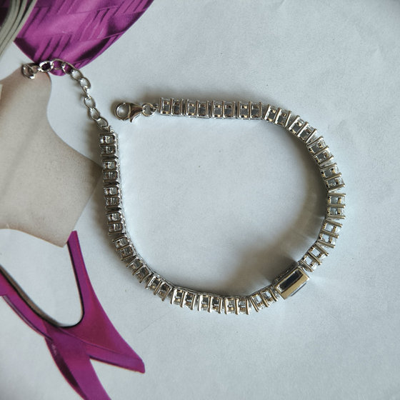 Silver bracelet with a sapphire
