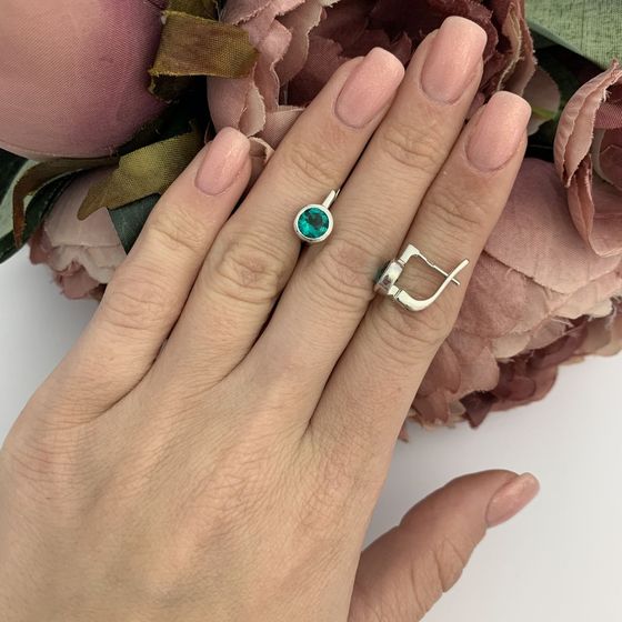 Silver earrings with a 1.225-carat nano emerald