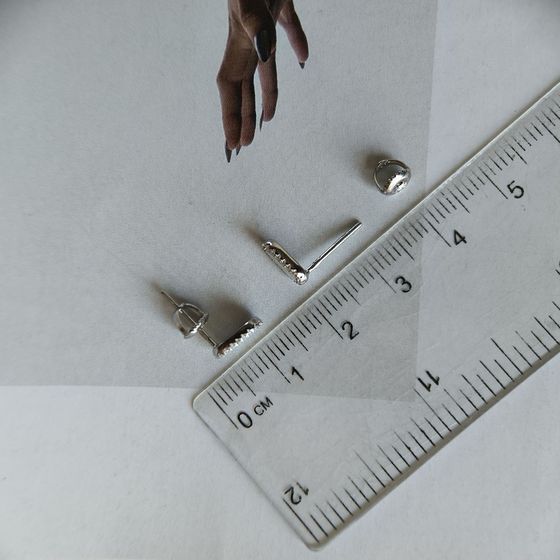 Silver earrings with mother-of-pearl, fianites