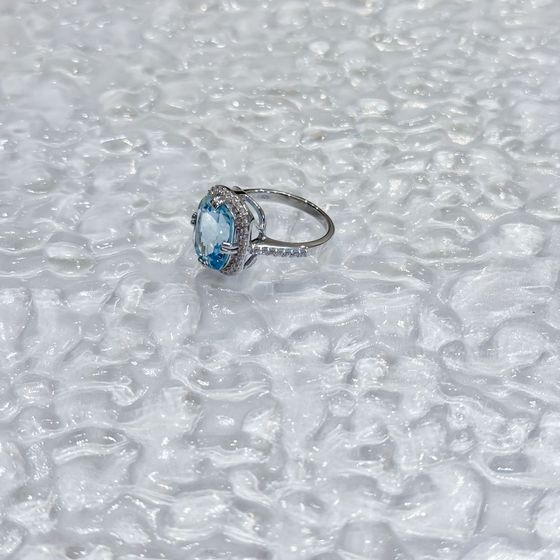 Silver ring with a 6.507-carat topaz and cubic zirconia