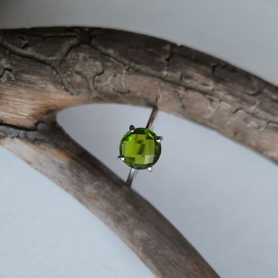 Silver ring with a 2.285-carat chrysolite