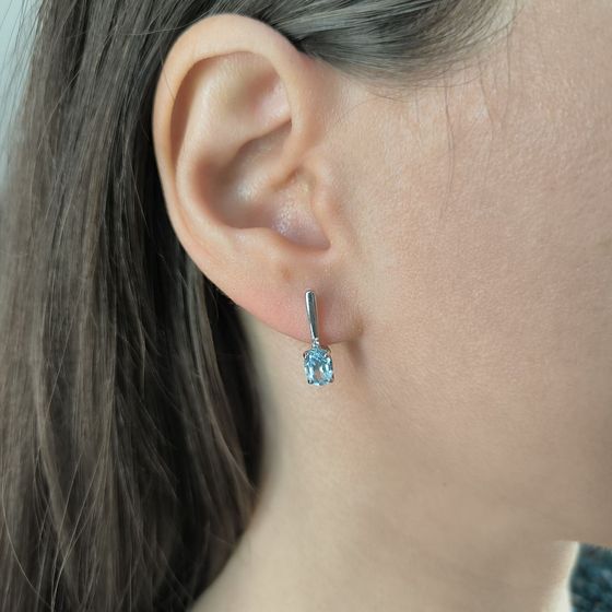 Silver earrings with a 1.874-carat topaz and cubic zirconia