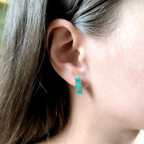 Silver earrings with a 2.006-carat emerald and cubic zirconia