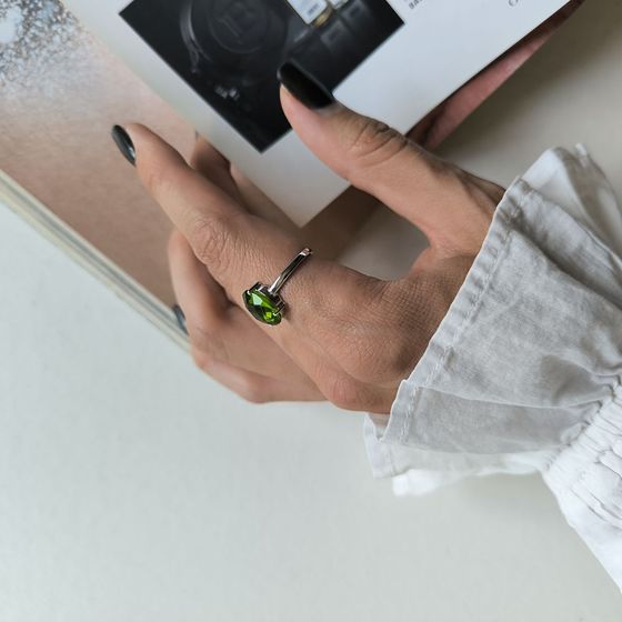 Silver ring with a 3.89-carat chrysolite