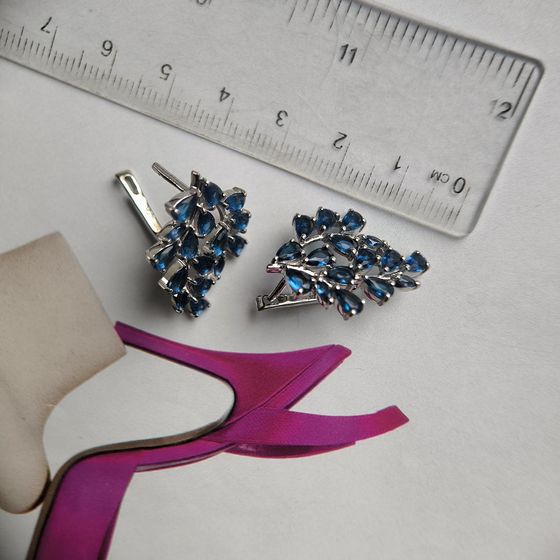 Silver earrings with a 4.31-carat nano sapphire