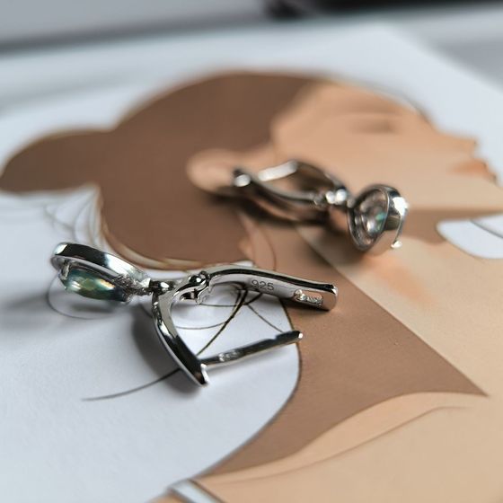 Silver Earrings with a 1.06-carat Mystic Topaz