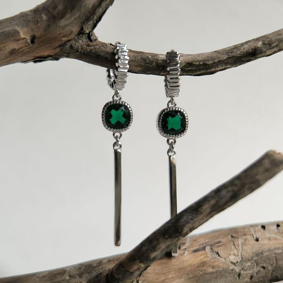 Silver earrings with a 1.892-carat nano emerald