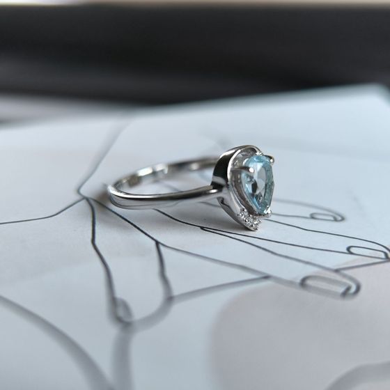 Silver ring with a 0.893-carat topaz and cubic zirconia