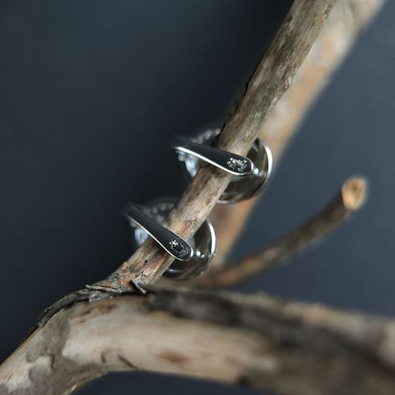 Silver earrings with mother-of-pearl, fianites