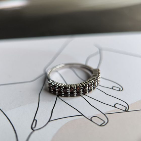Silver ring with a garnet