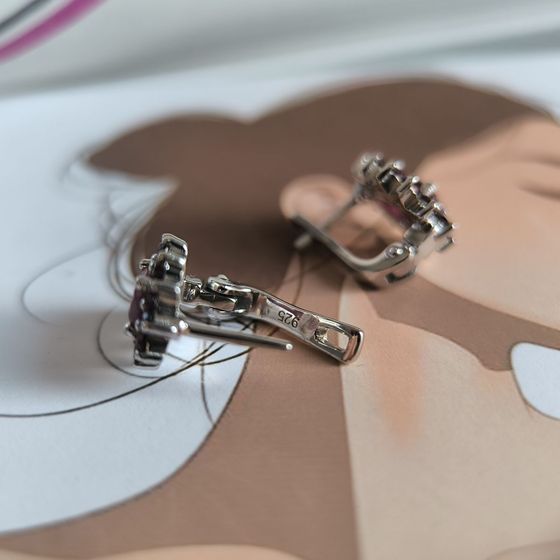 Silver earrings with a 3.225-carat ruby and garnet