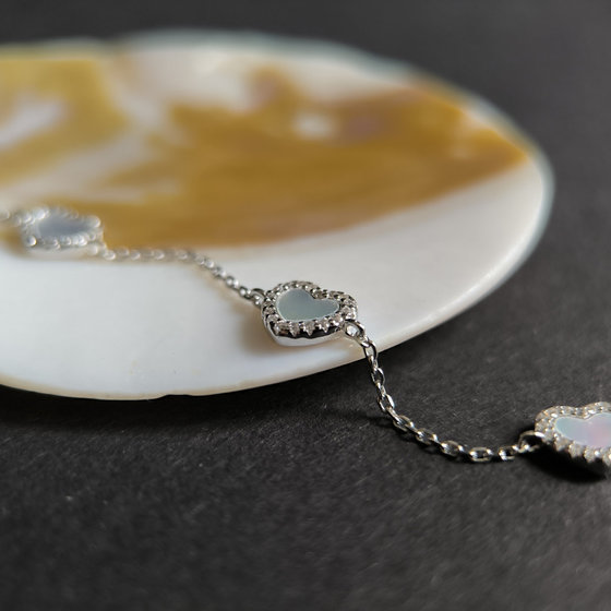 Silver bracelet with mother-of-pearl and cubic zirconia