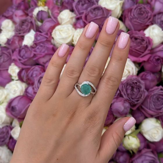 Silver ring with emerald, fianites