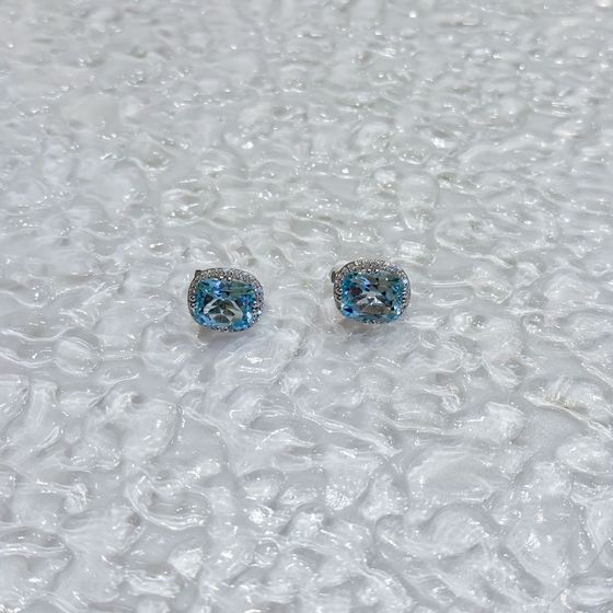 Silver earrings with a 12.432-carat topaz and cubic zirconia