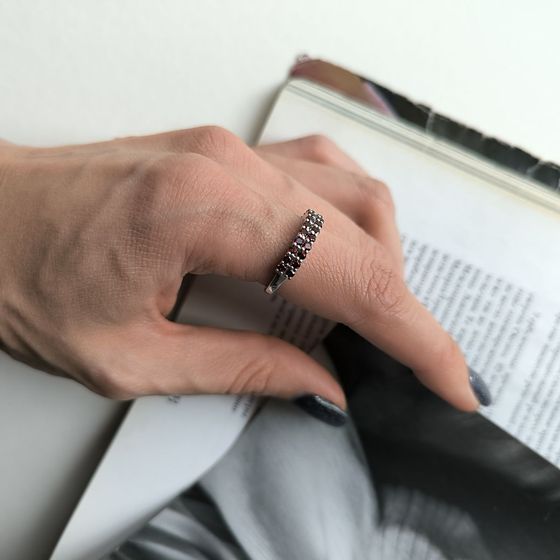 Silver ring with a garnet