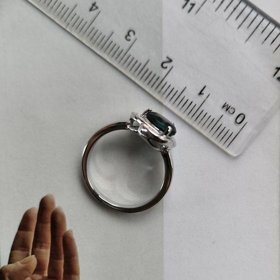 Silver ring with a London Blue topaz and cubic zirconia