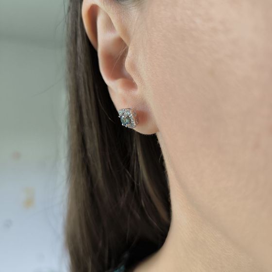 Silver earrings with a 0.648-carat mystic topaz