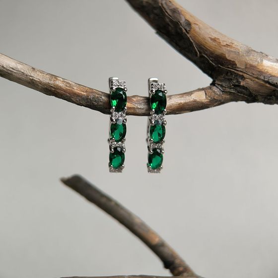 Silver earrings with a 2.114-carat nano emerald
