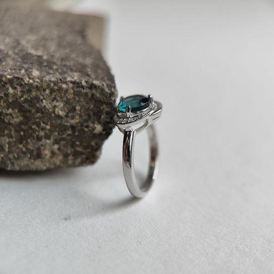Silver ring with a London Blue topaz and cubic zirconia