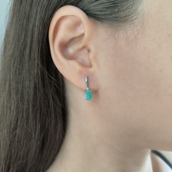 Silver earrings with emerald, fianites