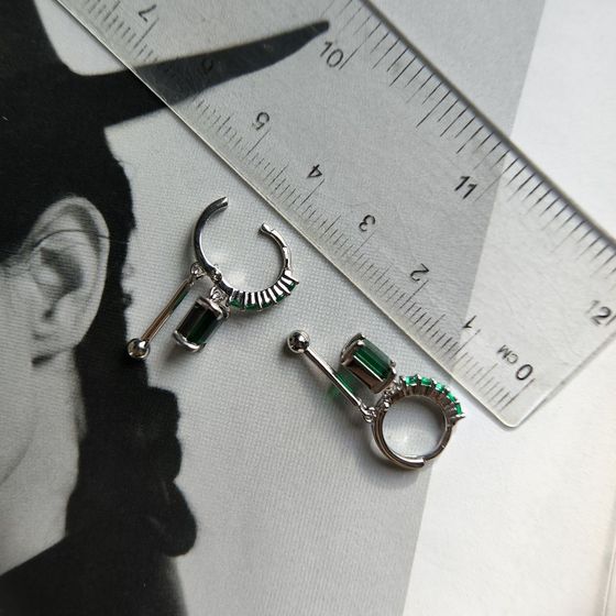 Silver earrings with a 2.295-carat nano emerald