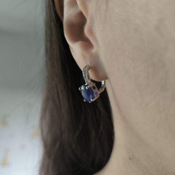 Silver earrings with a 6.528-carat sapphire and cubic zirconia