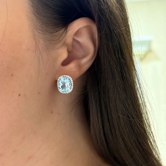Silver earrings with a 12.432-carat topaz and cubic zirconia
