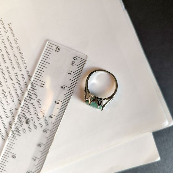 Silver ring with emerald