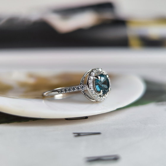 Silver ring with London Blue topaz and cubic zirconia