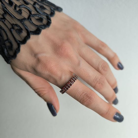 Silver ring with a garnet