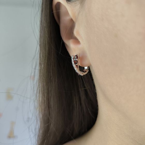 Sterling silver earrings with 1.556ct garnet, pianites