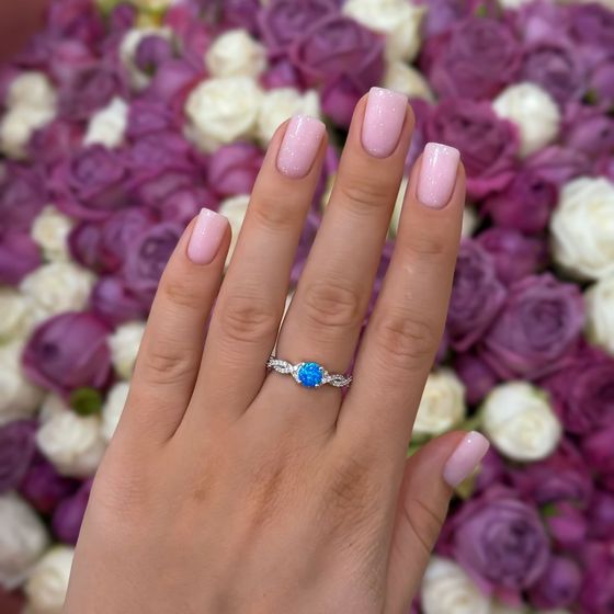 Silver ring with opal and cubic zirconia