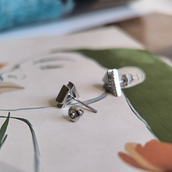 Silver earrings with mother-of-pearl, fianites