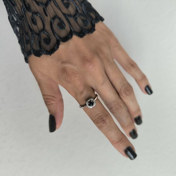 Silver ring with a 0.525-carat sapphire and cubic zirconia